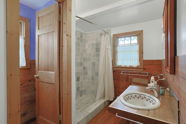 2 Amber Ridge Rd, Chestnut Ridge, NY 10977 - full bath featuring a shower stall, wood walls, a wainscoted wall, vanity, and wood finished floors