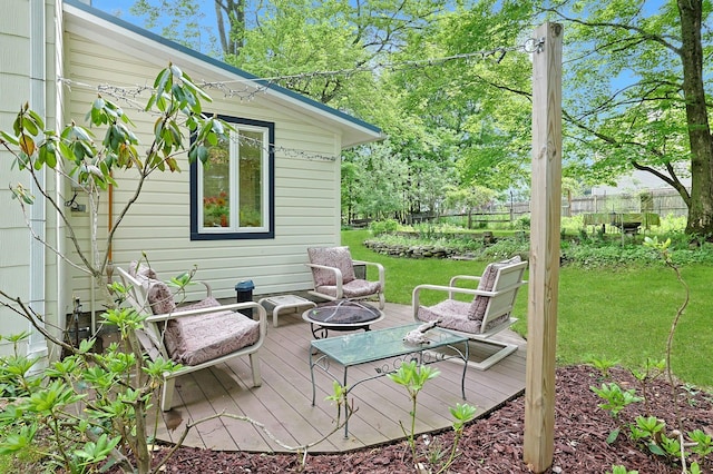 2 Amber Ridge Rd, Chestnut Ridge, NY 10977 - wooden deck with an outdoor fire pit and a lawn
