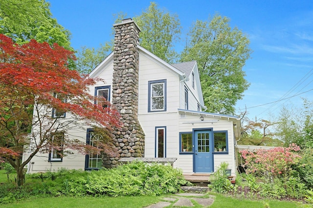 2 Amber Ridge Rd, Chestnut Ridge, NY 10977 - view of front of property with a chimney