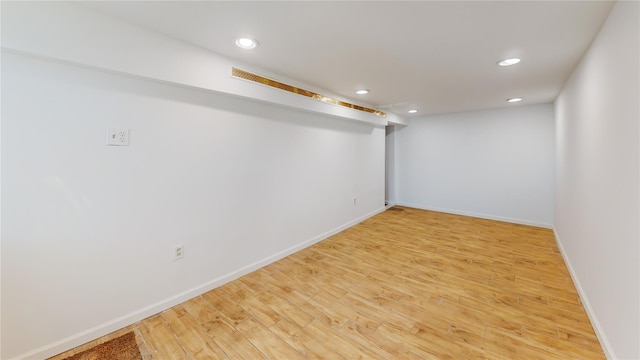 48-17 54th Ave, Maspeth, NY 11378 - finished below grade area featuring recessed lighting, light wood-type flooring, and baseboards