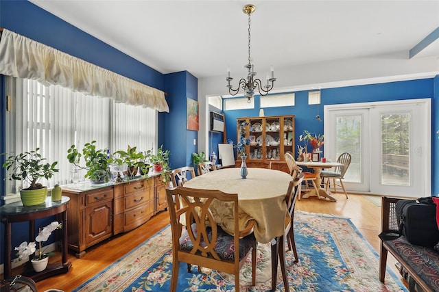 42 Longview Ave, White Plains, NY 10605 - dining space featuring a chandelier and light wood-style floors