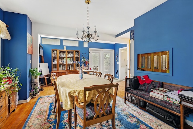 42 Longview Ave, White Plains, NY 10605 - dining space with a chandelier, wood finished floors, and french doors