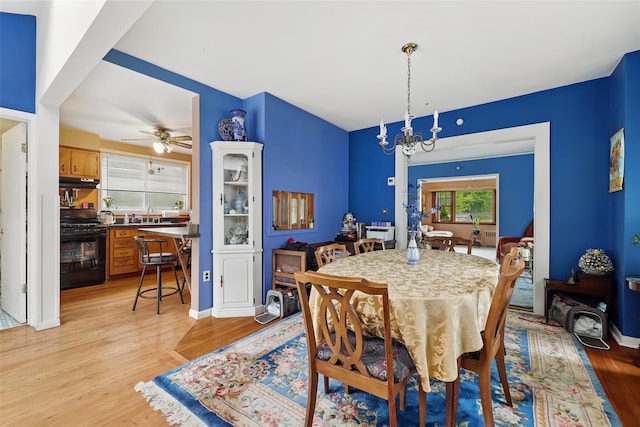 42 Longview Ave, White Plains, NY 10605 - dining room featuring a chandelier, light wood-style floors, and ceiling fan