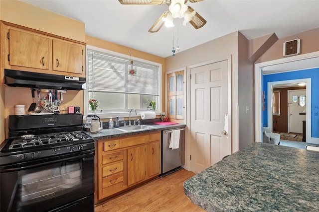 42 Longview Ave, White Plains, NY 10605 - kitchen with black gas range oven, dishwasher, under cabinet range hood, a sink, and dark countertops