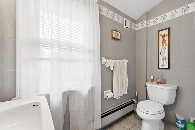 42 Longview Ave, White Plains, NY 10605 - bathroom featuring a baseboard radiator, toilet, tile walls, tile patterned flooring, and lofted ceiling