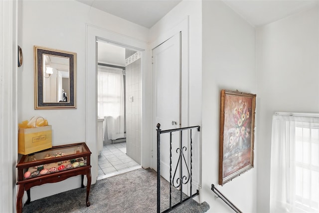 42 Longview Ave, White Plains, NY 10605 - hall with carpet floors and an upstairs landing