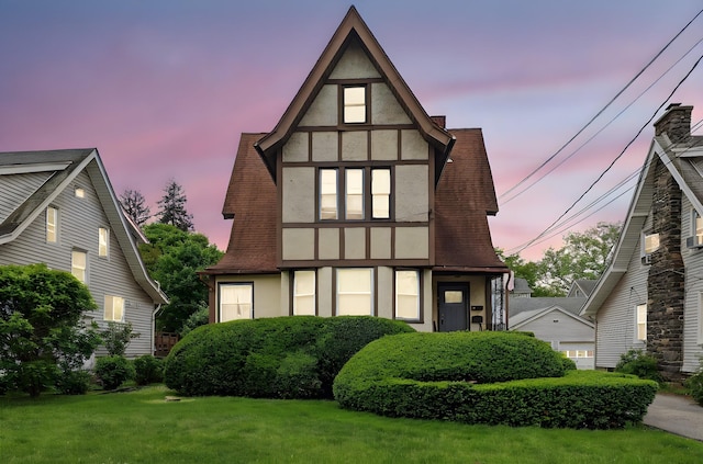 40 Longview Ave, White Plains, NY 10605 - tudor-style house with stucco siding and a front lawn