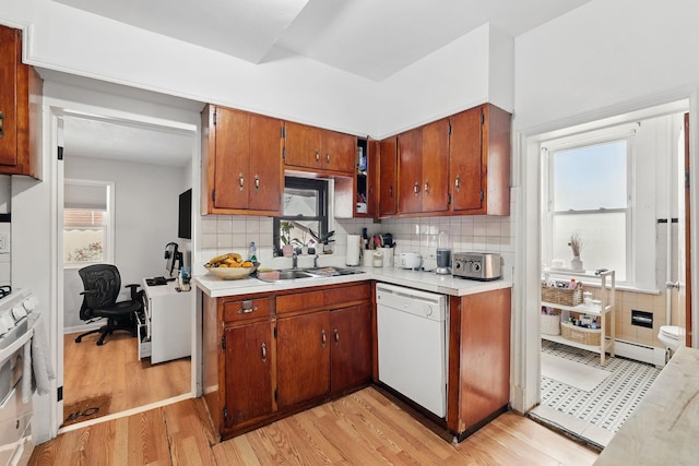 40 Longview Ave, White Plains, NY 10605 - kitchen featuring dishwasher, a sink, light countertops, and plenty of natural light