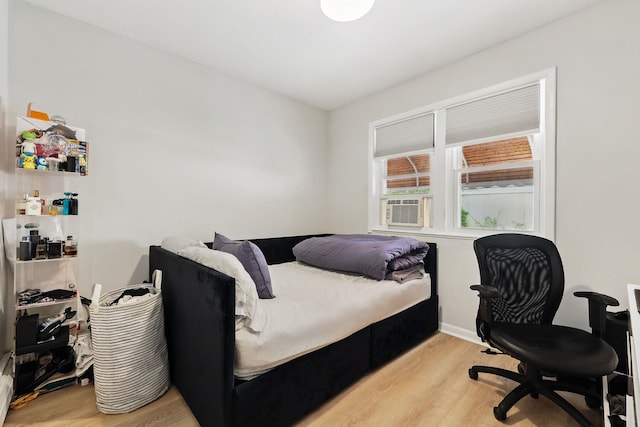 40 Longview Ave, White Plains, NY 10605 - bedroom featuring wood finished floors, a desk, and baseboards