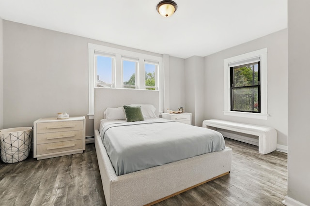 40 Longview Ave, White Plains, NY 10605 - bedroom with multiple windows, dark wood-type flooring, and baseboards
