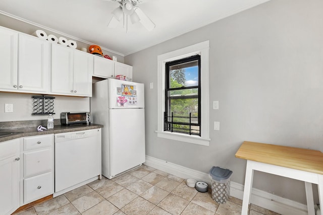 40 Longview Ave, White Plains, NY 10605 - kitchen featuring white appliances, baseboards, dark countertops, white cabinetry, and ornamental molding