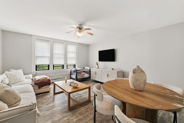40 Longview Ave, White Plains, NY 10605 - living area with ceiling fan, wood finished floors, and a baseboard heating unit