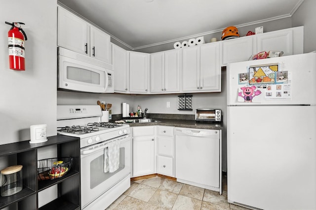 40 Longview Ave, White Plains, NY 10605 - kitchen with white appliances, a sink, dark countertops, white cabinetry, and ornamental molding