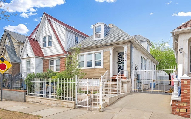 view of front facade with a gate and a fenced front yard