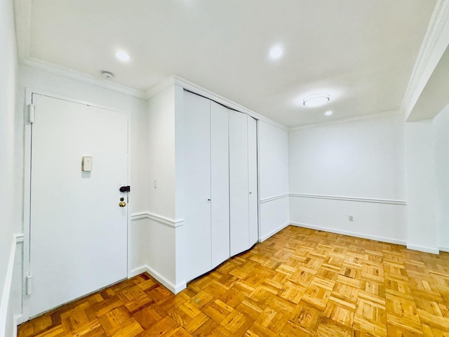 unfurnished bedroom featuring ornamental molding, baseboards, recessed lighting, and a closet