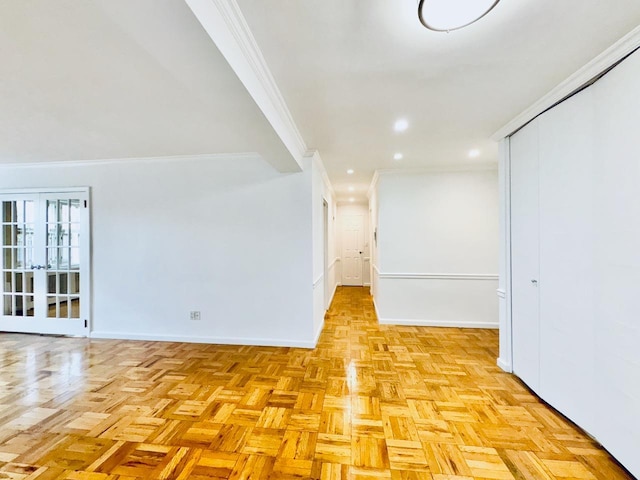 empty room featuring ornamental molding, baseboards, and recessed lighting