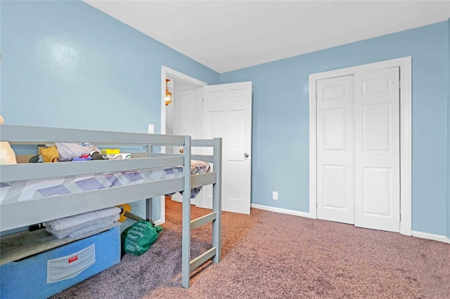 13-10 212th St Unit 118, Bayside, NY 11360 - bedroom featuring baseboards and carpet flooring