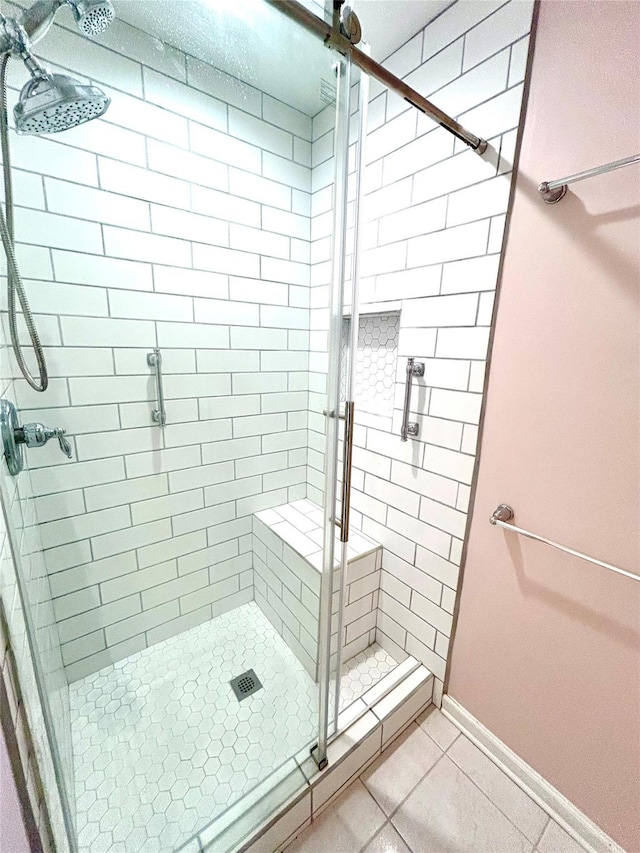 19 Brighton Dr Unit 1703, Newburgh, NY 12550 - bathroom with tile patterned floors, a shower stall, and baseboards