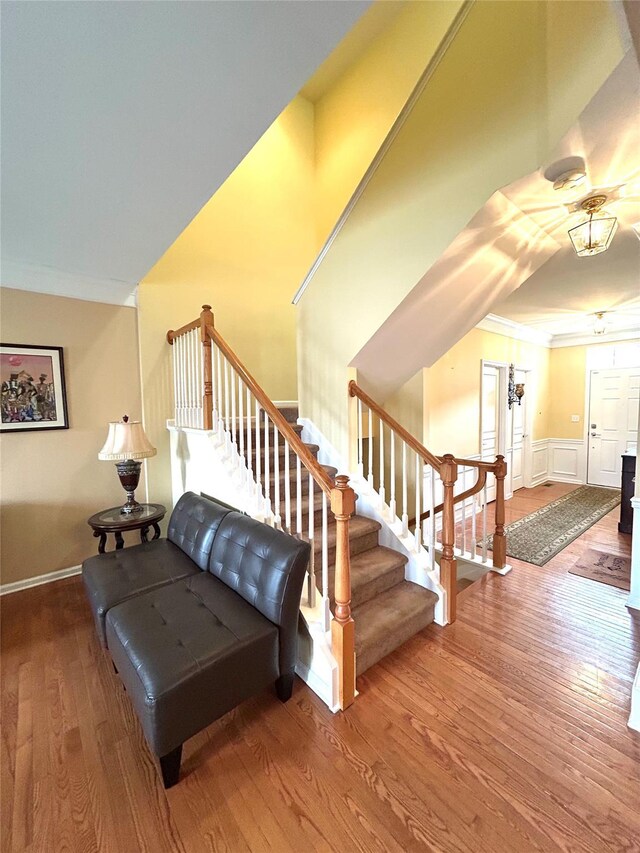 19 Brighton Dr Unit 1703, Newburgh, NY 12550 - stairs featuring wood finished floors, wainscoting, and crown molding