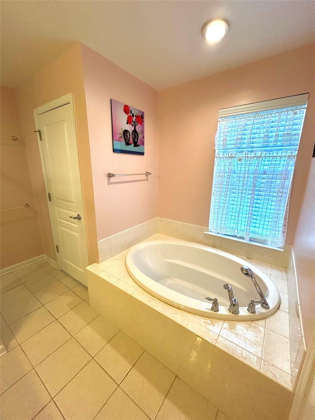 19 Brighton Dr Unit 1703, Newburgh, NY 12550 - full bath with a garden tub and tile patterned floors