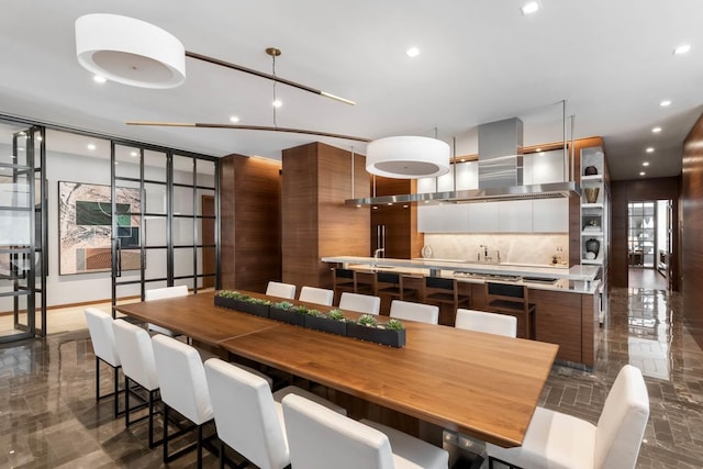 dining space with recessed lighting