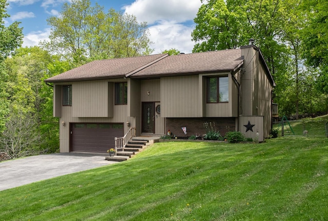 15 Marshall Dr, Poughkeepsie, NY 12601 - bi-level home featuring a chimney, an attached garage, a shingled roof, driveway, and a front lawn