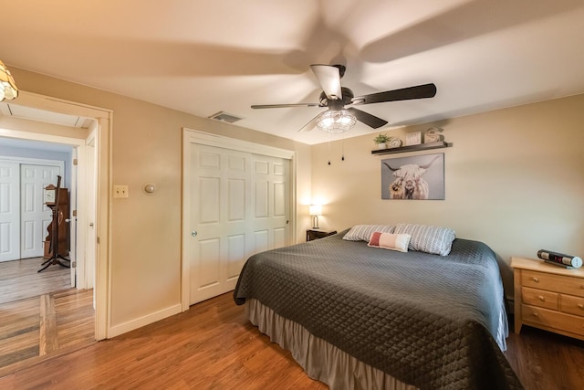15 Marshall Dr, Poughkeepsie, NY 12601 - bedroom featuring attic access, wood finished floors, a closet, a ceiling fan, and baseboards