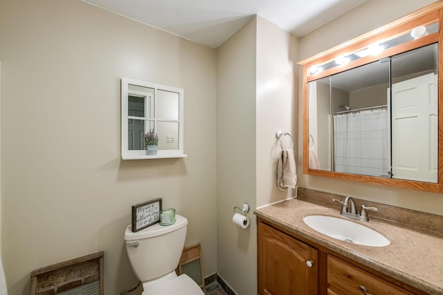 15 Marshall Dr, Poughkeepsie, NY 12601 - full bathroom featuring toilet, vanity, and a shower with curtain