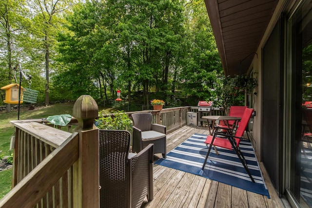 15 Marshall Dr, Poughkeepsie, NY 12601 - deck featuring outdoor dining area and view of wooded area