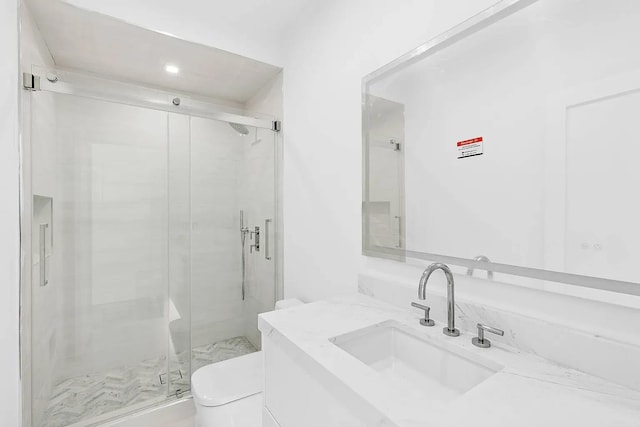 3 Dellaria Ave, Southampton, NY 11968 - full bathroom featuring toilet, vanity, and a stall shower