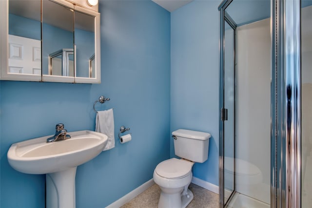 31 Bayberry Ln, Sag Harbor, NY 11963 - full bath featuring toilet, a stall shower, and baseboards