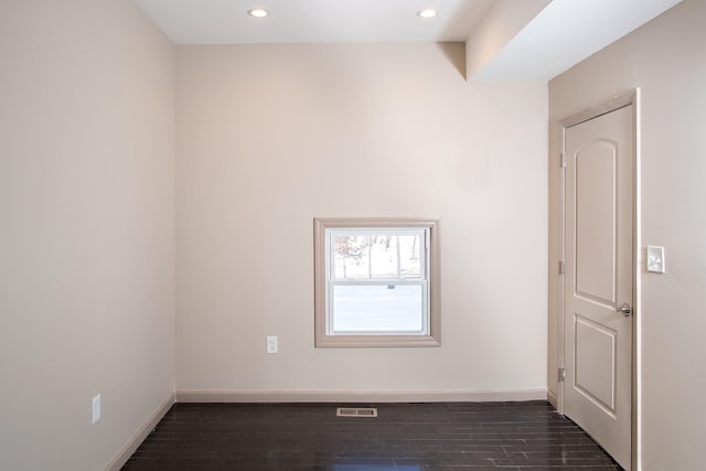 unfurnished room featuring baseboards, recessed lighting, and dark wood-style floors