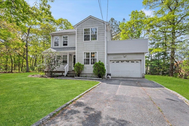 53 Shore Rd, Hampton Bays, NY 11946 - traditional-style home with asphalt driveway, covered porch, a garage, and a front yard