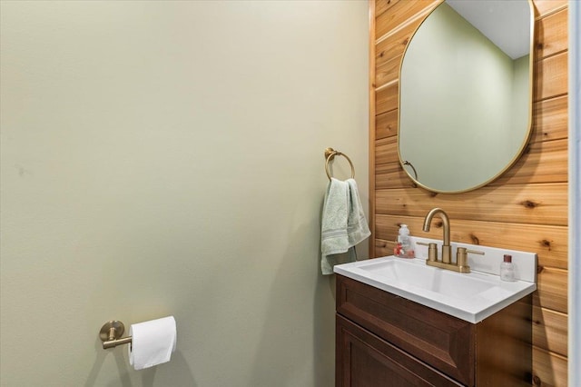 53 Shore Rd, Hampton Bays, NY 11946 - bathroom with wooden walls and vanity