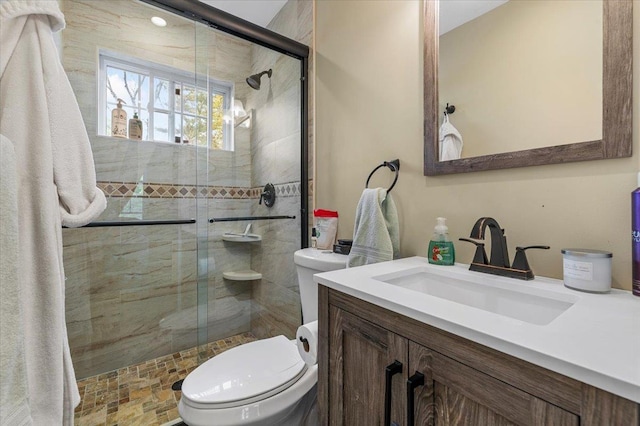 53 Shore Rd, Hampton Bays, NY 11946 - bathroom with toilet, a stall shower, and vanity