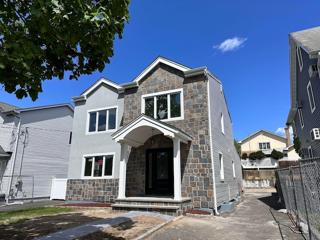 40 Allen St, New Hyde Park, NY 11040 - view of front facade with stone siding and stucco siding