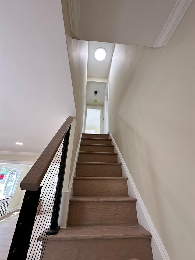 40 Allen St, New Hyde Park, NY 11040 - stairs with wood finished floors and baseboards