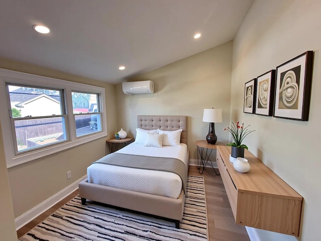 40 Allen St, New Hyde Park, NY 11040 - bedroom featuring a wall unit AC, baseboards, wood finished floors, and recessed lighting
