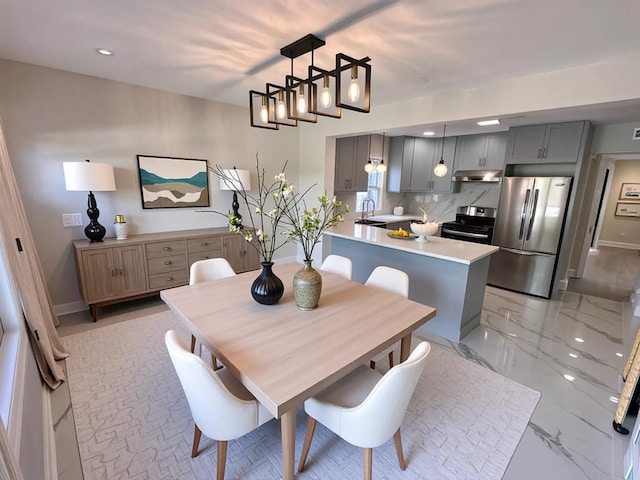 40 Allen St, New Hyde Park, NY 11040 - dining area with light marble finish flooring, recessed lighting, and baseboards