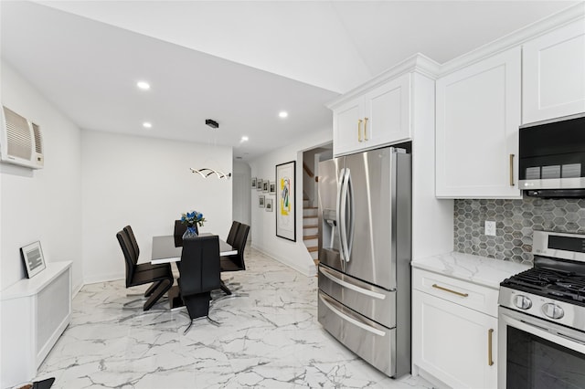 694 The Fenway, Baldwin, NY 11510 - kitchen featuring appliances with stainless steel finishes, recessed lighting, light marble finish floors, white cabinetry, and backsplash