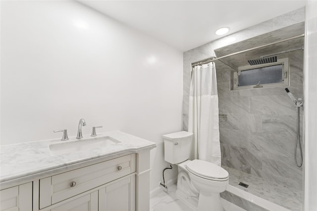 694 The Fenway, Baldwin, NY 11510 - full bath with tiled shower, toilet, marble finish floors, vanity, and recessed lighting
