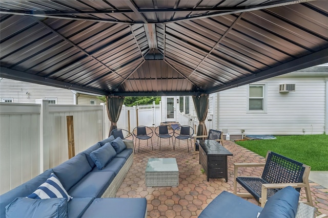 694 The Fenway, Baldwin, NY 11510 - view of patio featuring an outdoor living space, a gazebo, a fenced backyard, and a wall unit AC