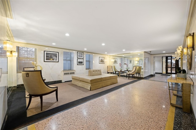 lobby featuring crown molding and recessed lighting