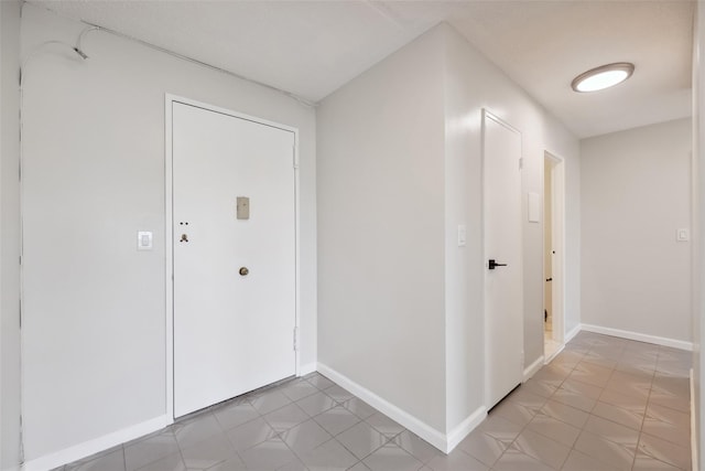 400 High Point Dr Unit 313, Hartsdale, NY 10530 - entrance foyer with baseboards