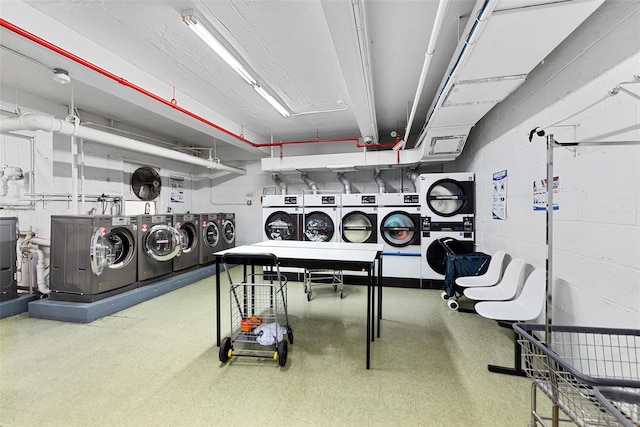 5500 Fieldston Rd Unit 77, Bronx, NY 10471 - community laundry room featuring stacked washer and clothes dryer and washing machine and dryer