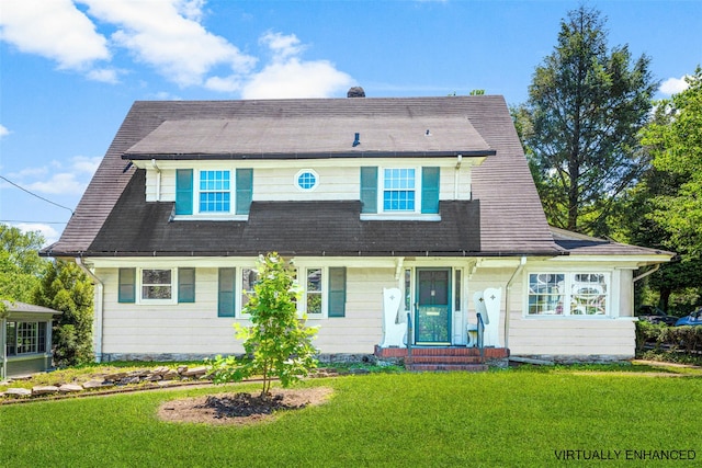 9 Summit Ave, Larchmont, NY 10538 - view of front of house with a front yard and roof with shingles