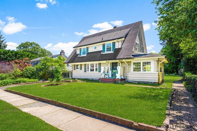 9 Summit Ave, Larchmont, NY 10538 - view of front of property featuring a front lawn, a chimney, and roof with shingles