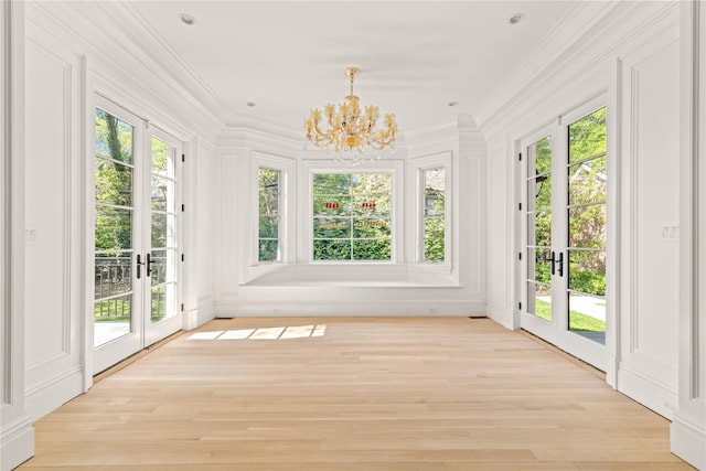 7 Beverly Rd, Kensington, NY 11021 - unfurnished sunroom with french doors and a chandelier