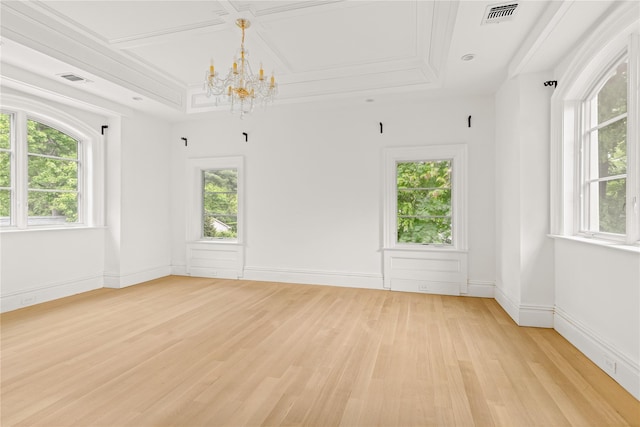 7 Beverly Rd, Kensington, NY 11021 - unfurnished room featuring a chandelier, plenty of natural light, light wood-style flooring, and coffered ceiling