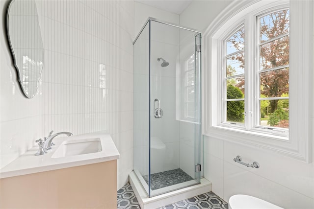7 Beverly Rd, Kensington, NY 11021 - full bath featuring tile walls, a shower stall, toilet, and vanity